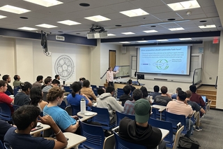 Charles giving seminar at UConn
