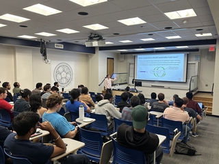 Charles giving seminar at UConn